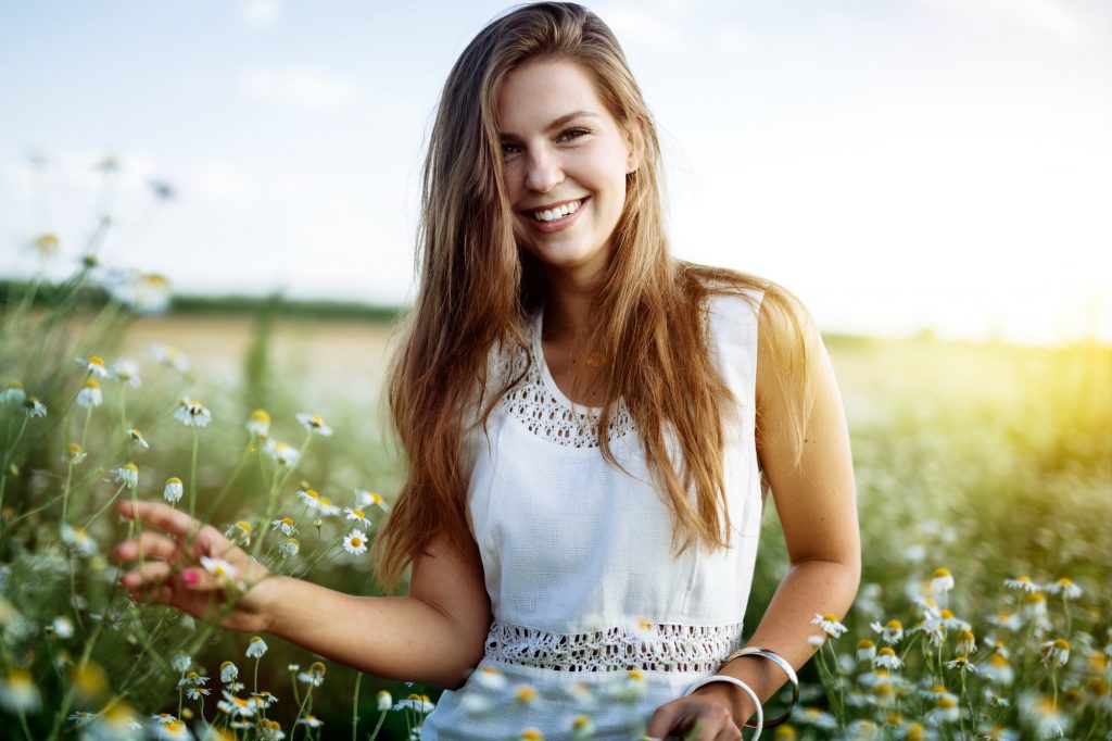 Beautiful woman in field